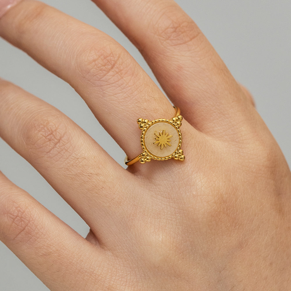 Gold gemstone star ring