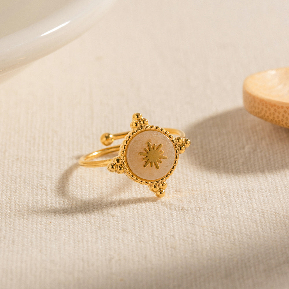 Gold gemstone star ring